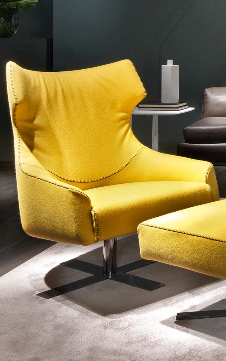 Yellow chair by Van der Voort Interiors